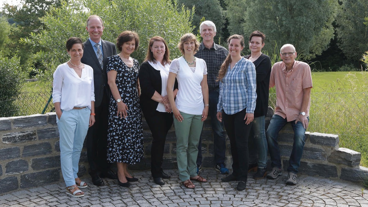 Die fröhliche Belegschaft